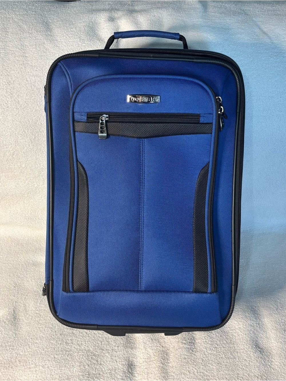 TravelPro Blue Carry-On Spinner Suitcase by